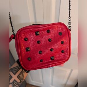 Small red studded vans purse